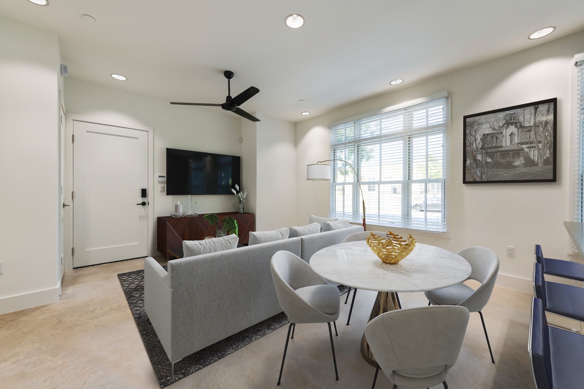 Unit 2-1 dining area with round marble table