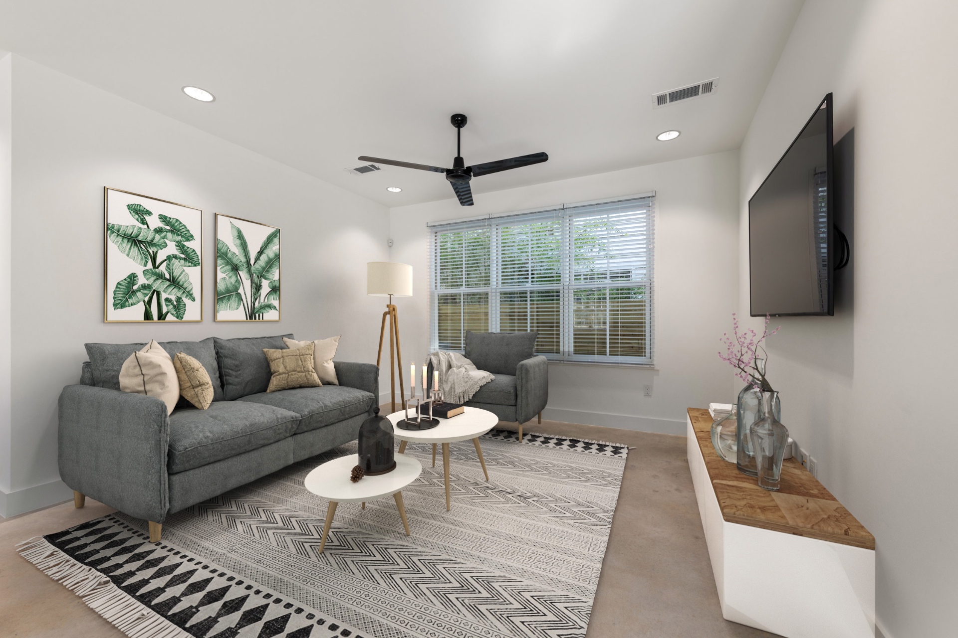 Building 3 living room with tripod lamp and gallery art